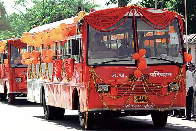  Chief Minister Yogi Adityanath led Uttar Pradesh government has been painting booklets, school bags and even buses to saffron, reports  The Indian Express . It all started when a saffron towel was put on Adityanath’s chair at his official residence and his car seat. Since then, saffron spread on to government booklets, school bags and even buses. On Wednesday, Adityanath flagged off 500 saffron colour buses of the State Road Transport Corporation, named ‘Sankalp Seva’. These buses are aimed to provide services in the rural areas. That is not all, even the stage was decorated with saffron curtains and the buses adorned with balloons. ( Picture courtesy: The Indian Express ) 