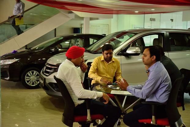   Subdued Diwali for auto makers as buyers stay away  

 It was a dull Diwali for carmakers this year as uncertainty over the impact of the Goods & Services Tax (GST) held back buyers, particularly businesspeople,  reports  Mint  . Retail volumes failed to keep pace with the large number of dispatches rolled out in the last couple of months by auto makers in anticipation of strong sales over the festive season that concluded with Dhanteras on October 17 —the first day of Diwali. Now, auto firms may have to reduce inventory in the months ahead. With the majority of the businesspeople still trying to familiarise themselves with GST, they are reluctant to make expensive purchases, said dealers. ( Photo courtesy: Mint ) 