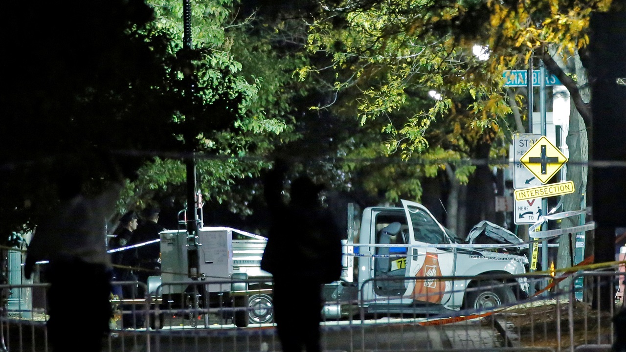   Police are seen investigating the scene of the truck attack on the West Side Highway in Manhattan, New York  