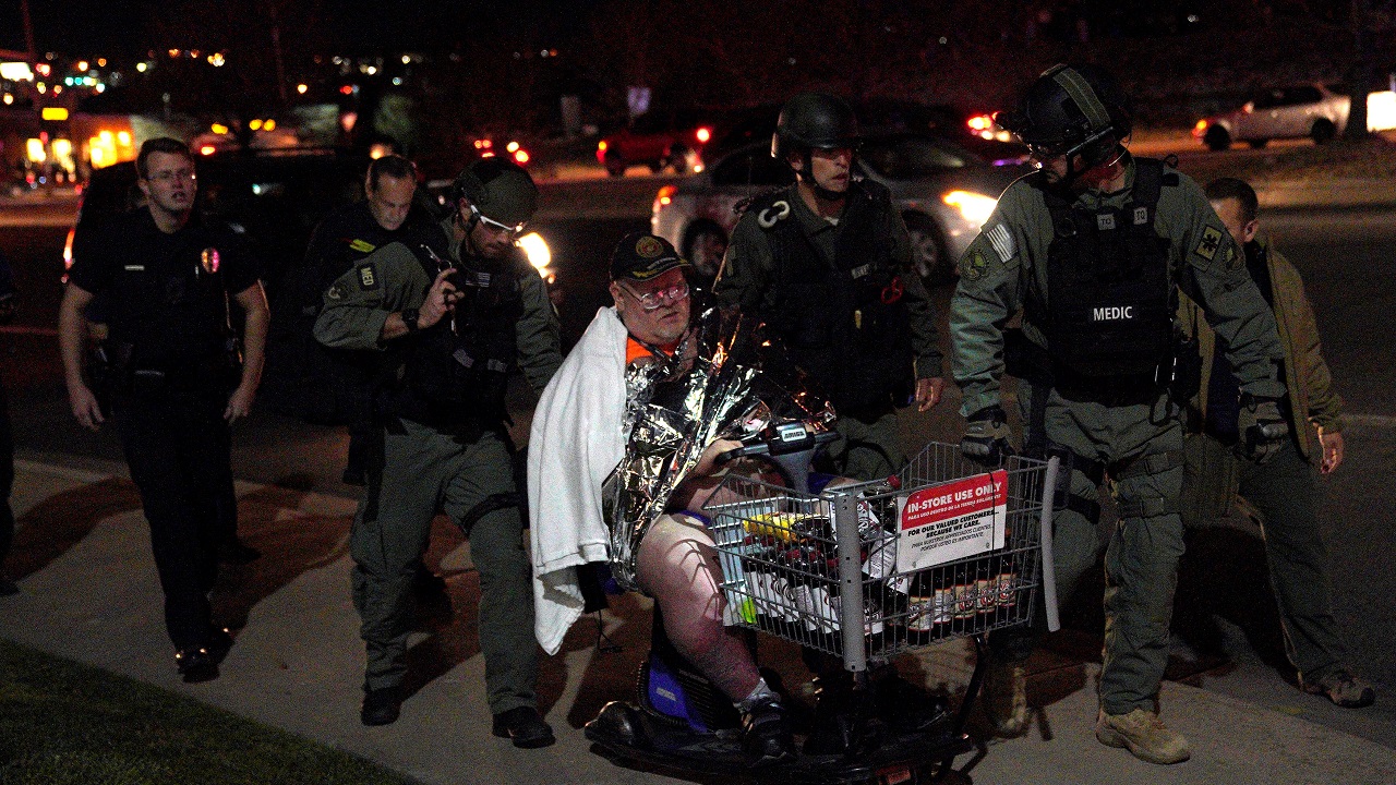   SWAT medics evacuating people from the shooting scene  