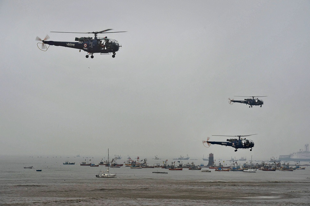   Mumbai:  Naval helicopters perform a routine drill off the Gateway of India as a part of Navy Day celebrations in Mumbai on Monday. December 4 is celebrated as Navy Day to celebrate Indian Navy’s achievement and as a tribute to the courage and determination made by the Indian Navy during the 1971 war. PTI 