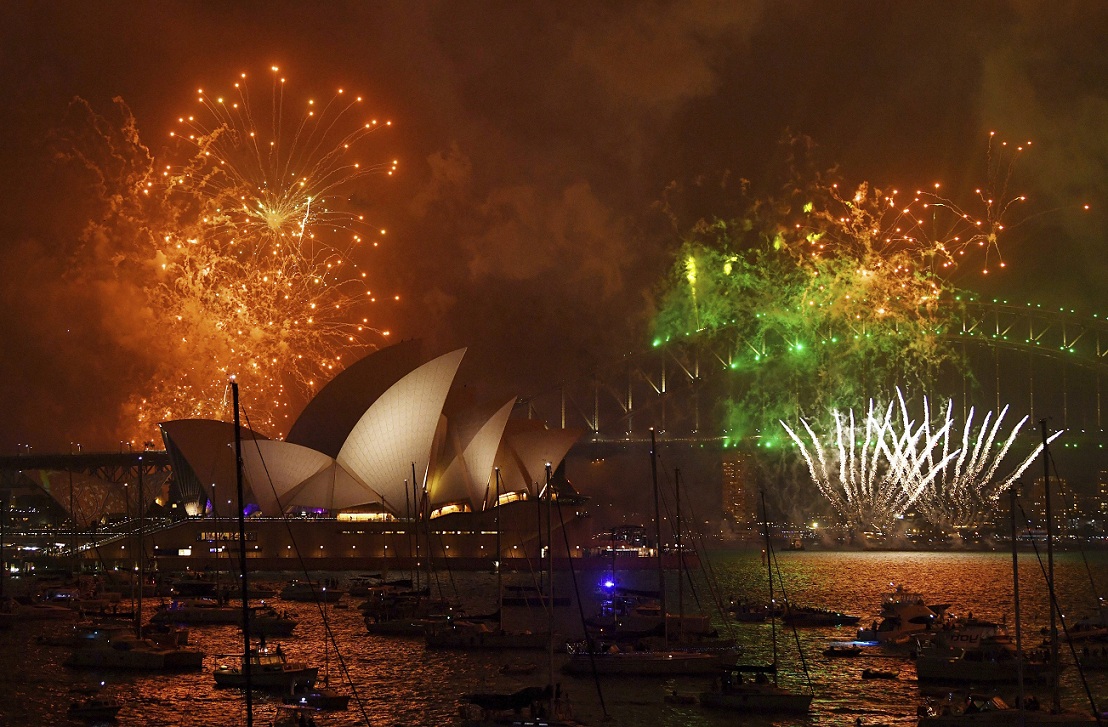    Fireworks explode over Sydney Harbour during New Year's Eve celebrations in Sydney, Australia. AP   