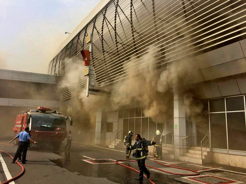    Fire-fighters dousing a fire that broke out at the Santacruz domestic airport in Mumbai on Saturday. PTI   