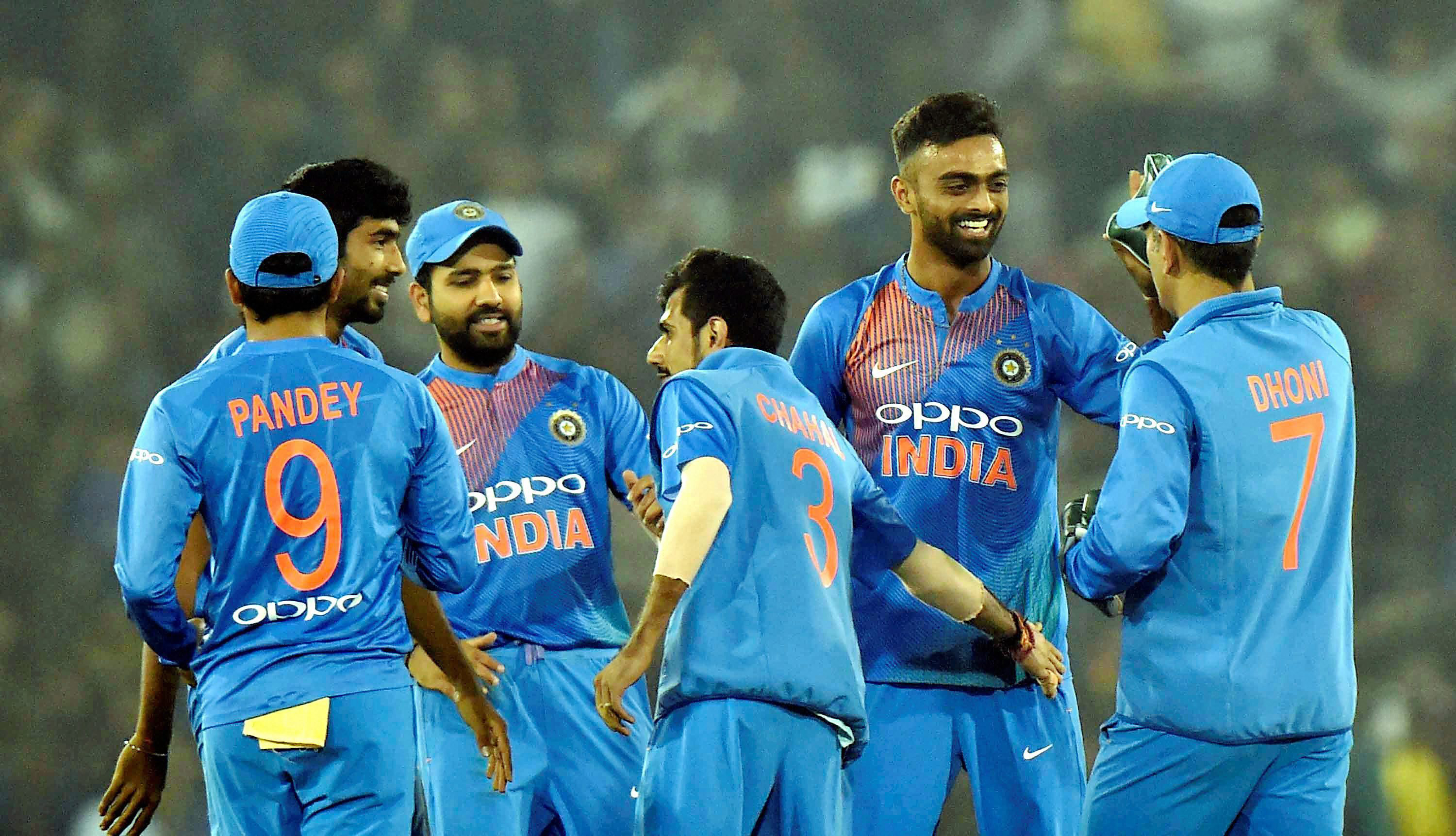 Cuttack: Indian cricketers celebrate the dismissal of a Sri Lankan batsman during the T20 match at Barabati Stadium in Cuttack on Wednesday. (PTI Photo by Ashok Bhaumik) Cuttack: Indian cricketers celebrate the dismissal of a Sri Lankan batsman during the T20 match at Barabati Stadium in Cuttack on Wednesday. (PTI Photo by Ashok Bhaumik)