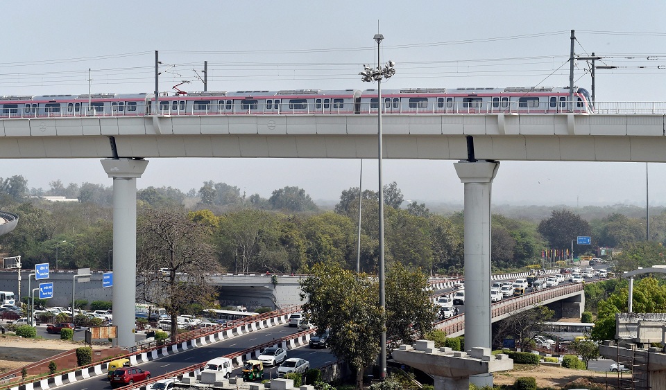    A Metro train moves across the new Majlis Park and Durgabai Deshmukh South Campus Metro section during a media preview in New Delhi on Monday. Majlis Park-Shiv Vihar corridor (Line 7) of the metro network, also known as the Pink Line, is part of the Phase-III project. PTI   