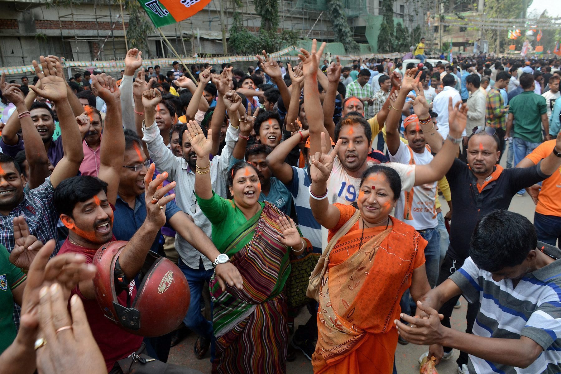  BJP supporters celebrate the party's show in the Tripura elections in Agartala on Saturday. — PTI 