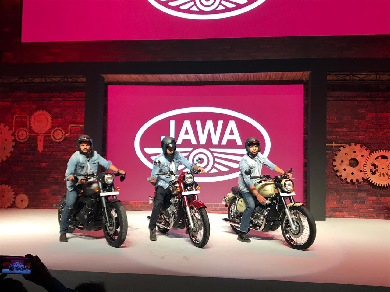 <p>Three bikes are being unveiled today. The black coloured bike is a bobber&nbsp;with a single seat</p>