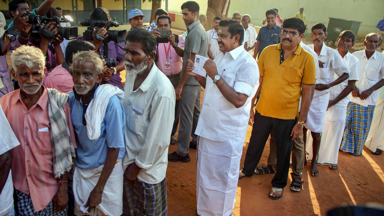    Tamil Nadu Chief Minister Edappadi K Palaniswami waits in a queue to cast his vote, during the second phase of the general election, in Salem. (Image: PTI)  