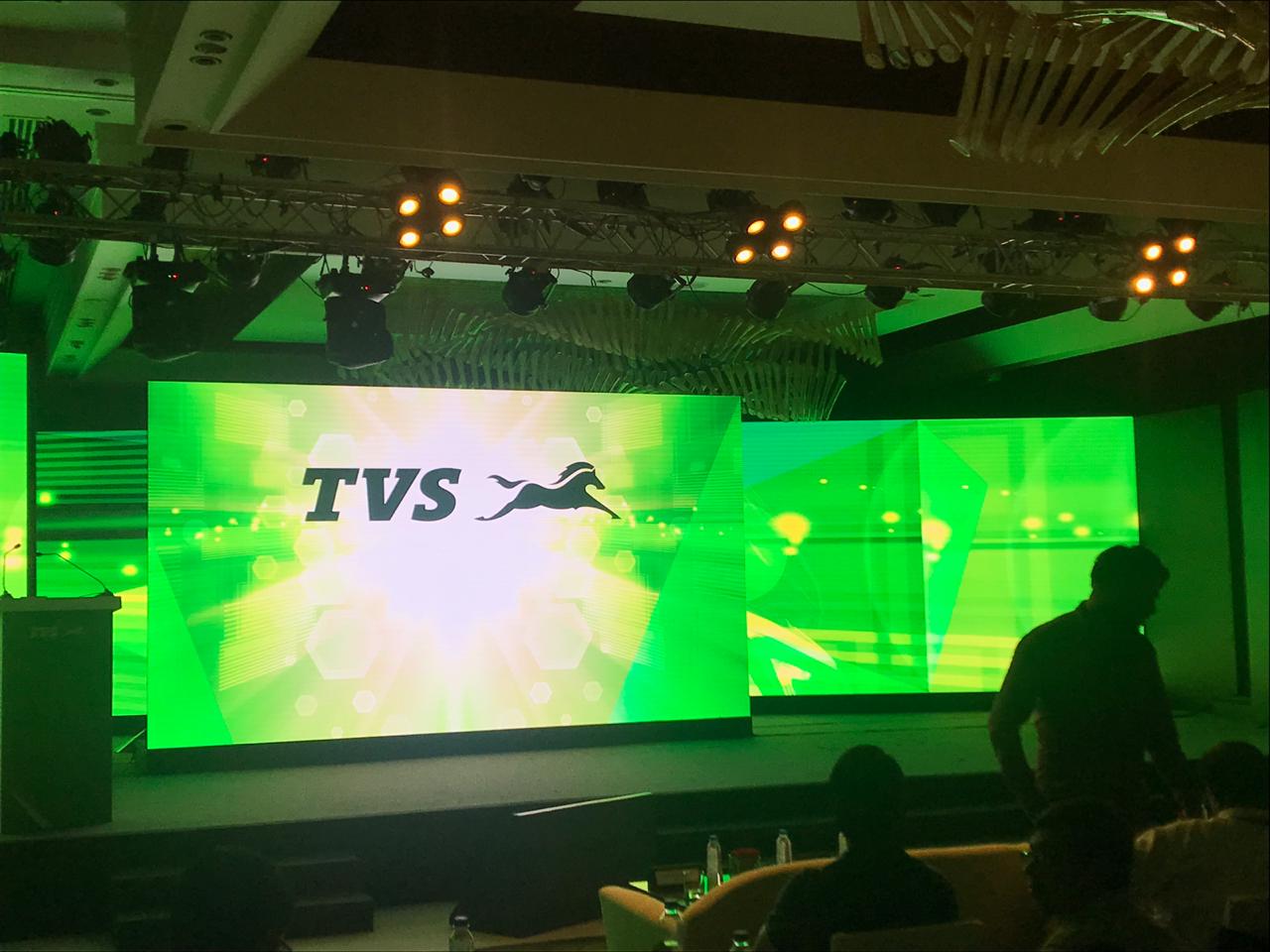 <p>We&rsquo;re in New Delhi! TVS Motor Company is set to make a &lsquo;green&rsquo; announcement. Reports hint at it launching an ethanol-powered Apache RTR 200 4V. Looks likely considering Nitin Gadkari, Minister for Road Transport and Highways will be present. Proceedings about to begin.</p>