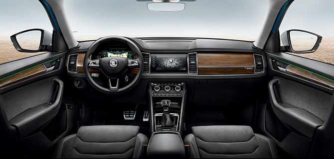 <p>The interiors of the Scout get a wood and grey design theme with Alcantara seat trim and Scout badging</p>