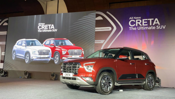 <p>The new Creta continues to be a global model and will be exported from India. It has attracted an investment of ₹1,000 crore.<br />
Seen here is the new burgundy shade which is the communication colour for the all new Creta.&nbsp;The car wears a face inspired by the Hyundai Palisade.&nbsp;The Creta in the image comes&nbsp;with the Adventure bolt-on kit comprising of the rubbing strips on the doors, and the side steps.The Creta gets 3 years complementary BlueLink subscription (available on top-end only) and a warranty package that can be extended for up to five years of coverage.</p>