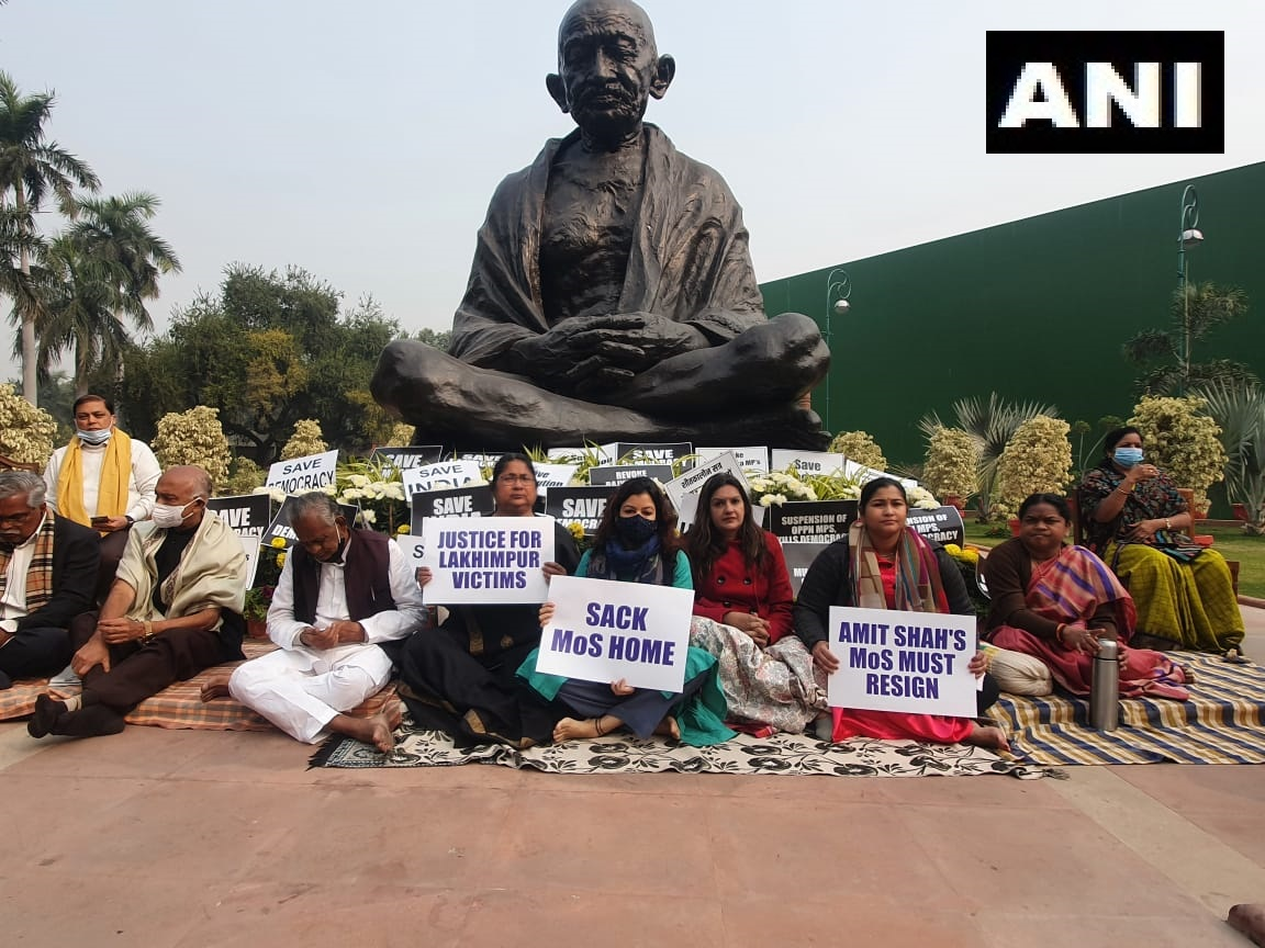  

 Suspended Rajya Sabha MPs continue their protest at Gandhi Statue on Parliament premises and demand the resignation of MoS Home Ajay Misra Teni over the Lakhimpur Kheri incident. 
 

 
  
 