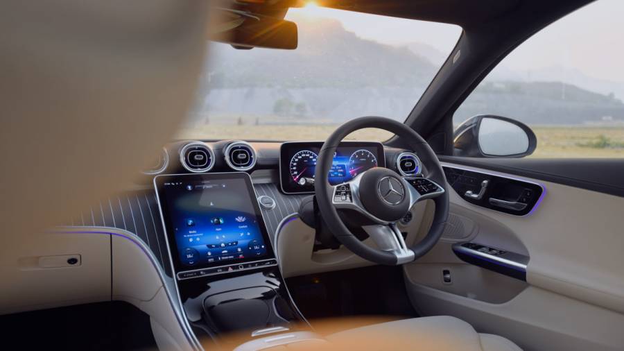 <p>The interiors of the 2022 Mercedes-Benz C-Class have also been modelled around that of the current S-Class, dominated by the large 11.9-inch vertical touchscreen, the high-mounted air vents&nbsp;and the T-shaped dash design with the cascading fascia</p>