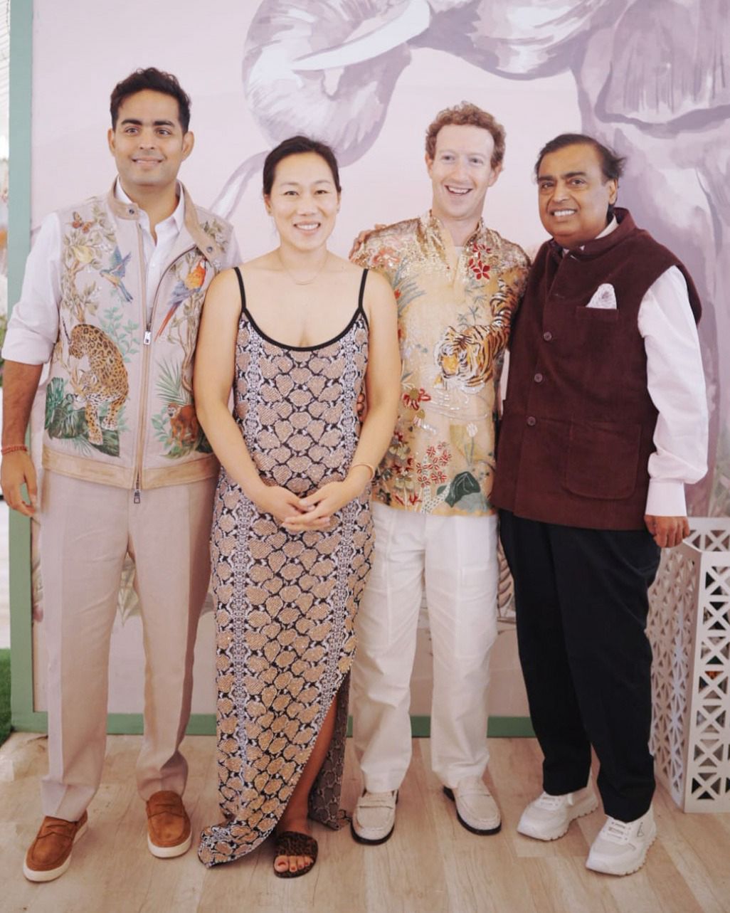 <p><strong>Anant Ambani-Radhika Merchant Wedding LIVE: Mark Zuckerburg, Priscilla Chan pose with Mukesh and Akash Ambani </strong><br />
Facebook CEO Mark Zuckerburg and wife Priscilla seem to enjoy day 2 as they pose merrily with groom Anant Ambani&#39;s father and brother, Mukesh and Akash Ambani. Mark can be seen wearing a vibrant shirt with flowers and tigers made on it while Priscilla is wearing a snake print dress with a slit. </p>